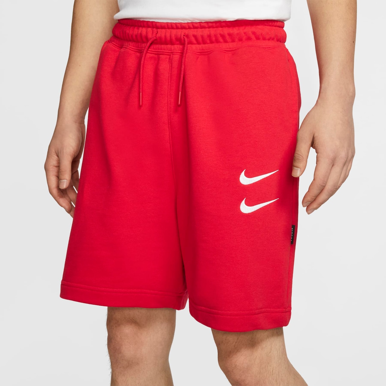 Large swoosh sales nike shorts