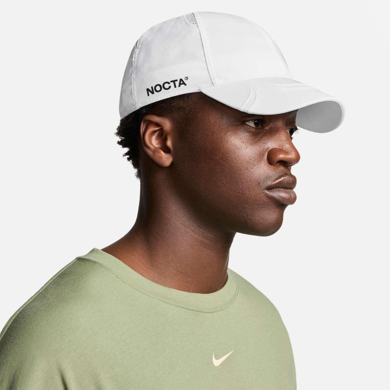 NIKE U NRG CLUB CAP NOCTA LART ENAMEL GREEN/LIGHT BONE/BLACK