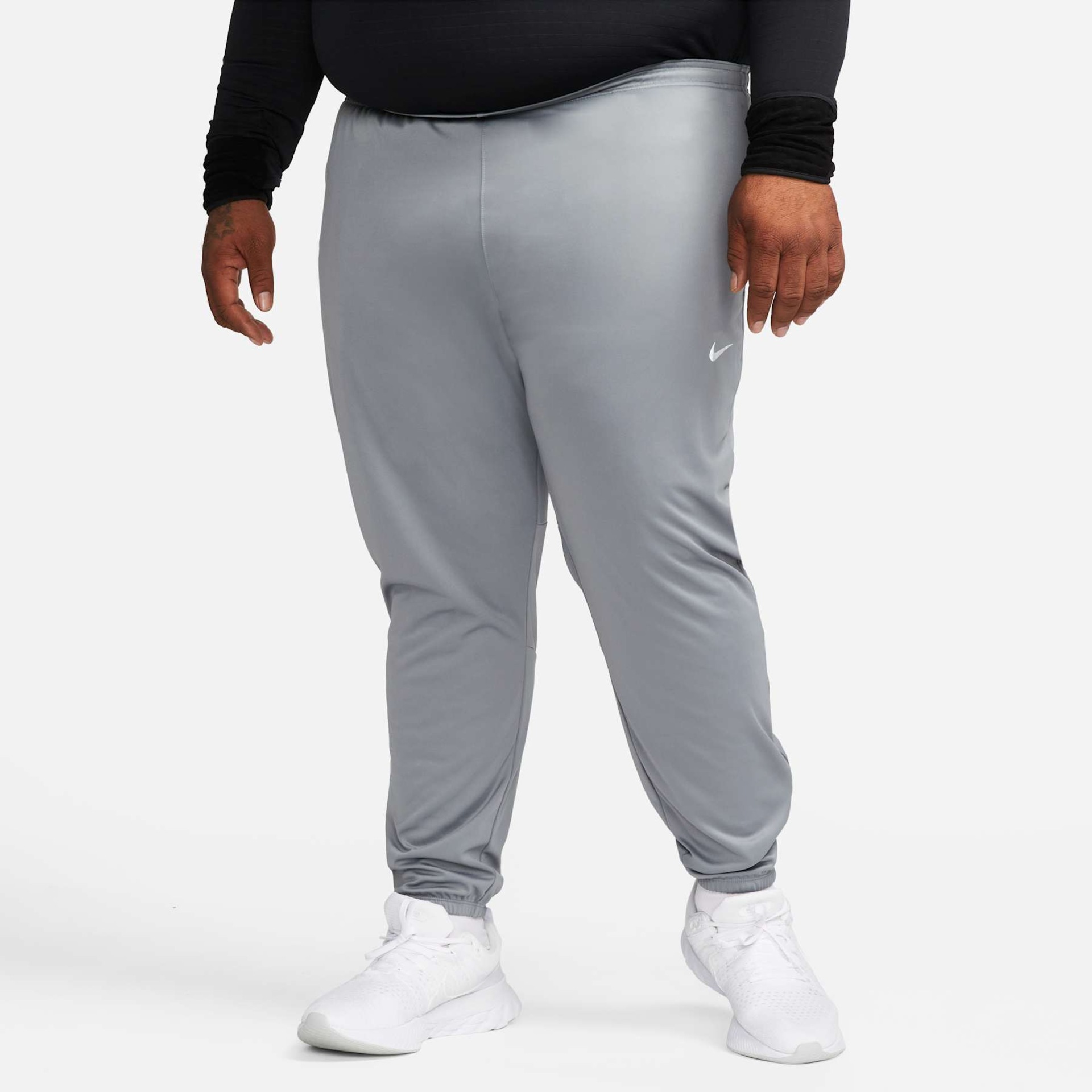 Calça Nike Dri-FIT Challenger Masculina - Foto 14