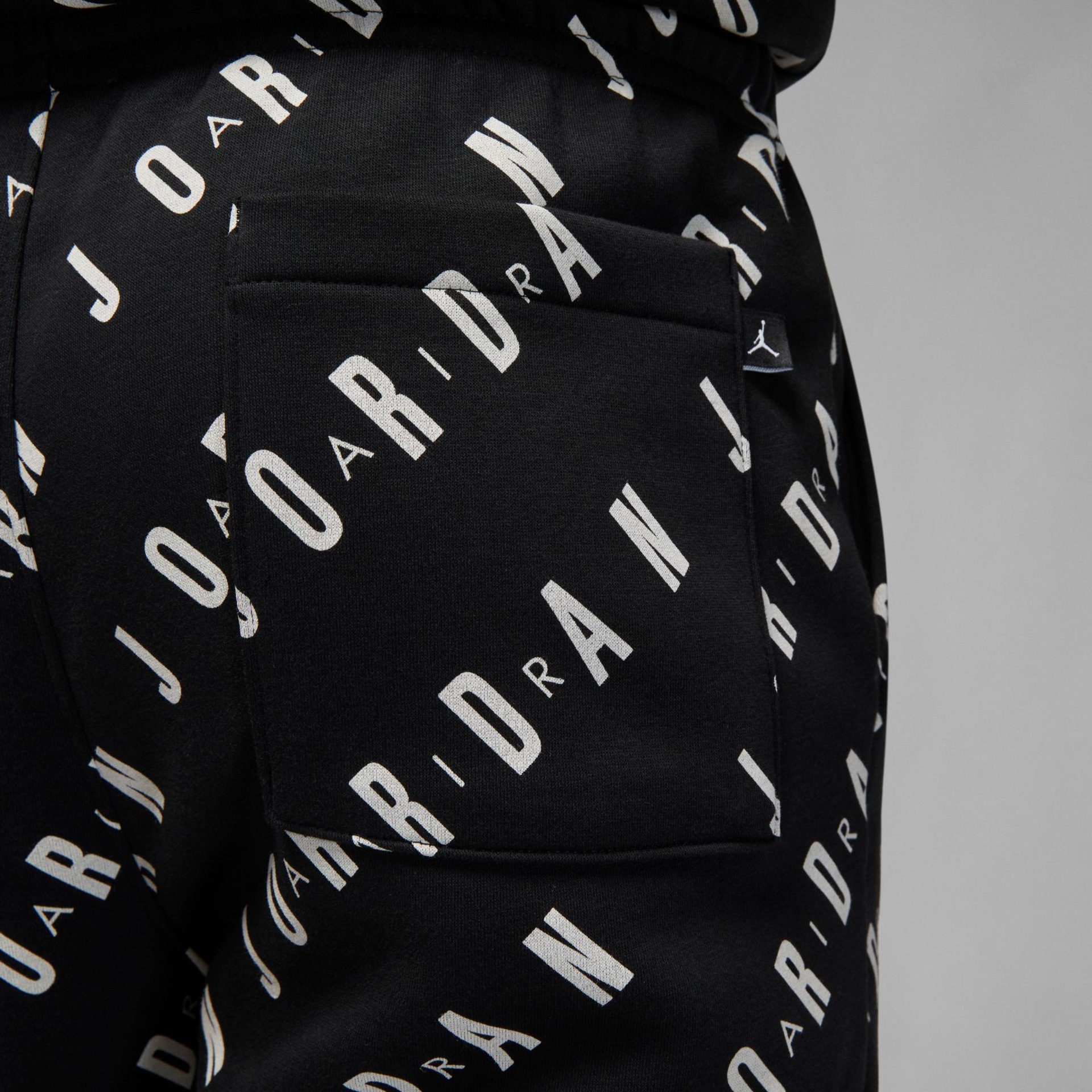 Calça Jordan Essential AOP Fleece Masculina - Foto 5