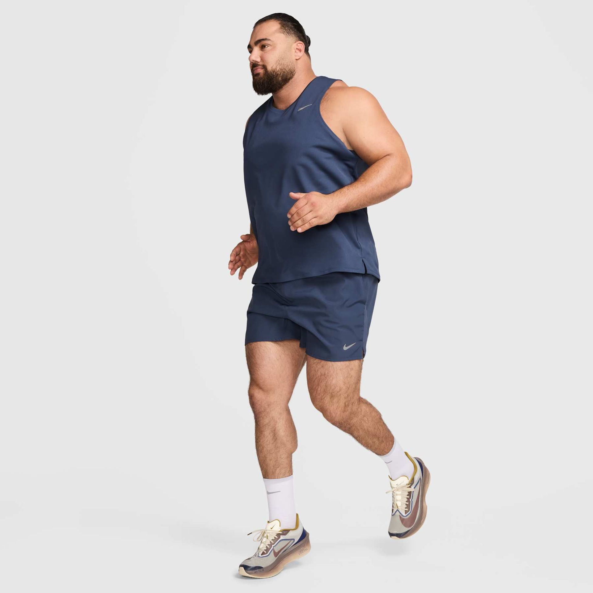 Shorts Nike Challenger Dri-FIT Masculino - Foto 17