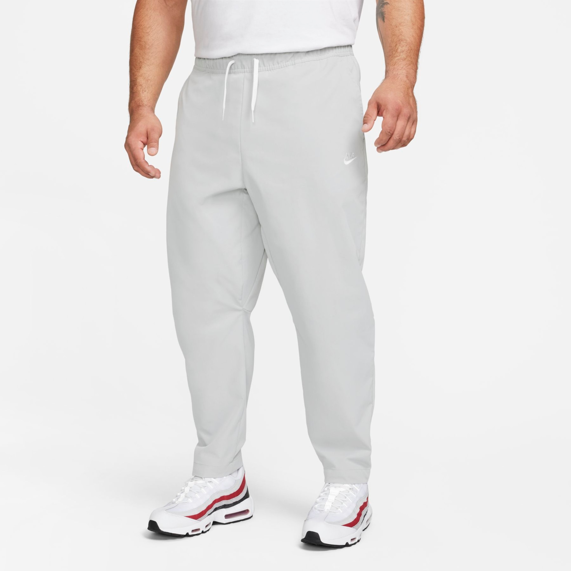 Calça Nike Club Woven Taper Masculina - Foto 7