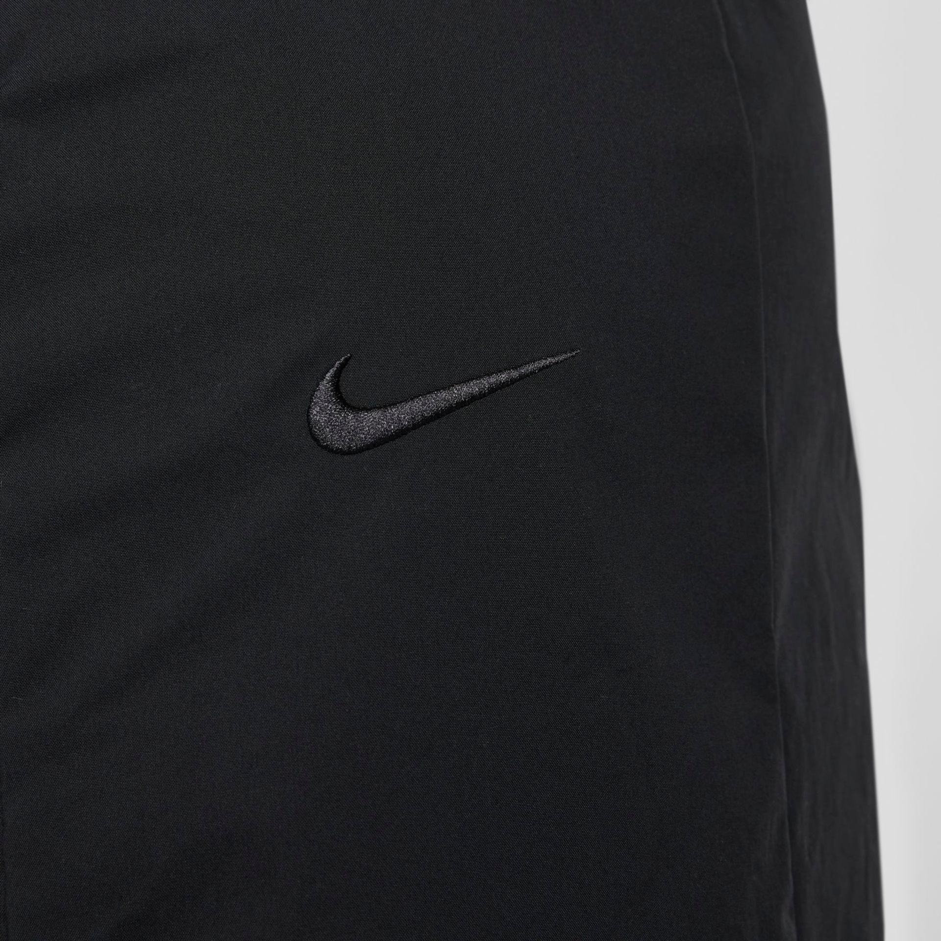 calça nike sportswear woven
