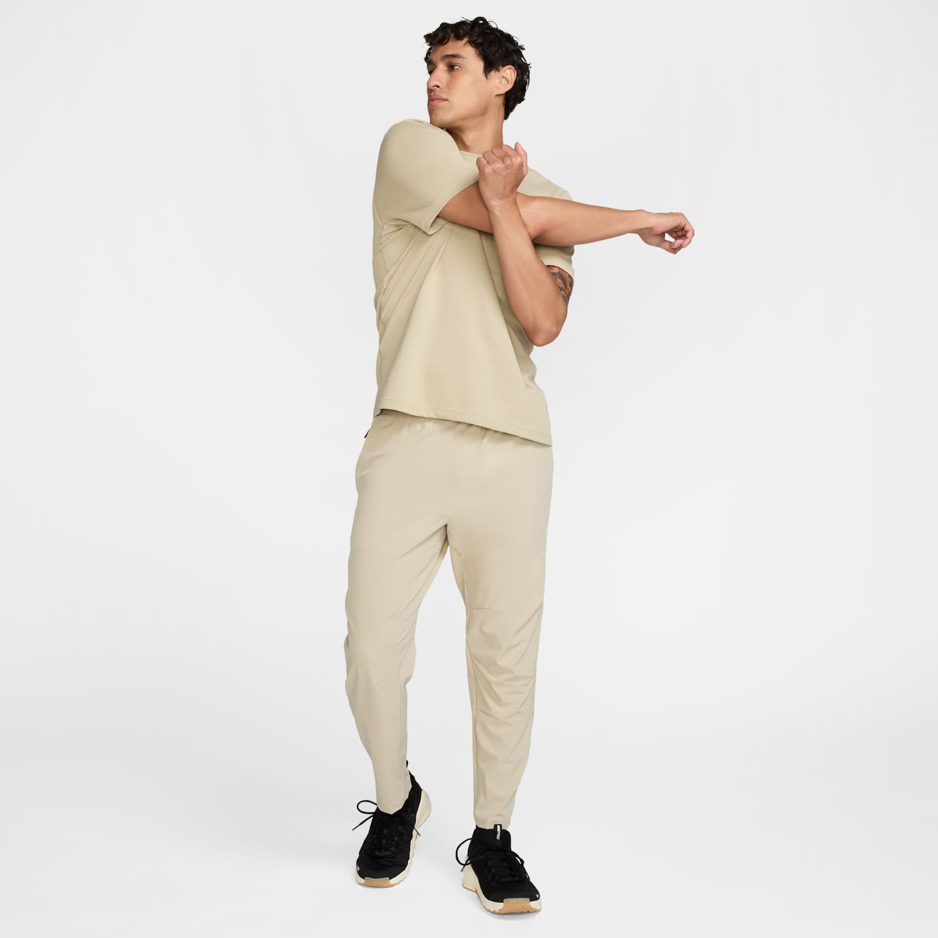 Calça Nike Dri-FIT Unlimited Masculina - Foto 6