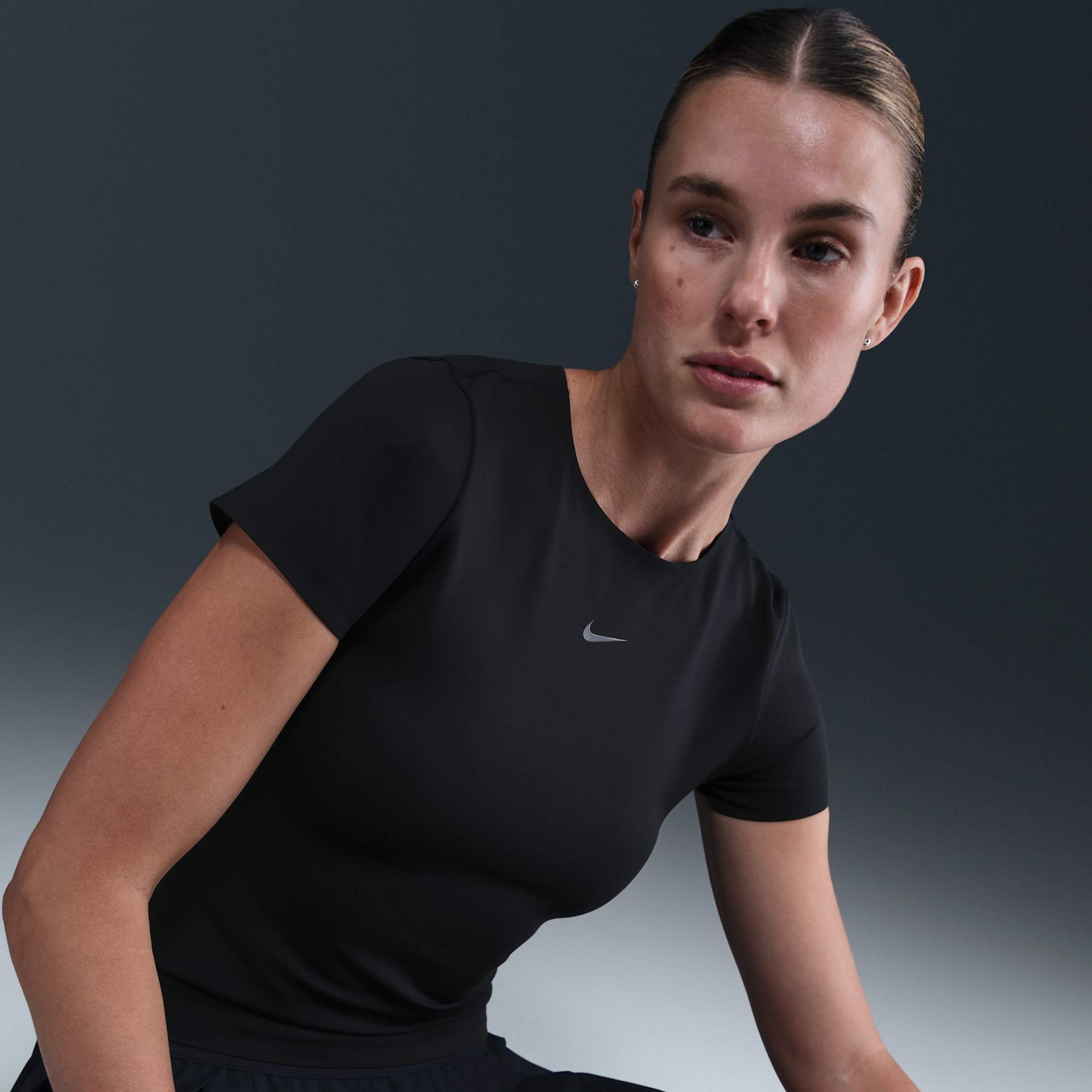 Camiseta Nike Dri-FIT Form Feminina - Foto 3