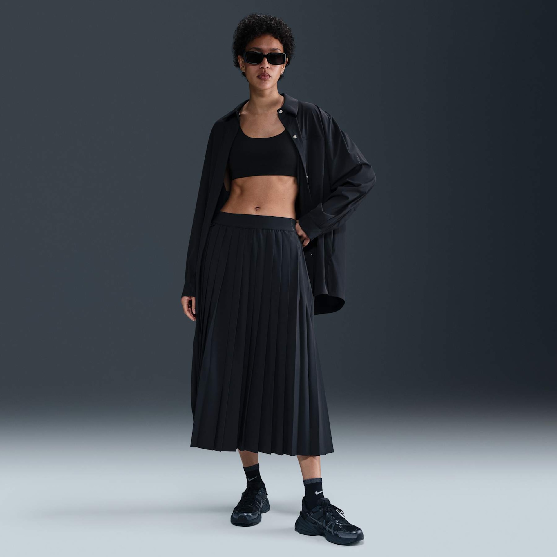 Saia Nike Dri-FIT Plissada 24.7 Feminina - Foto 1