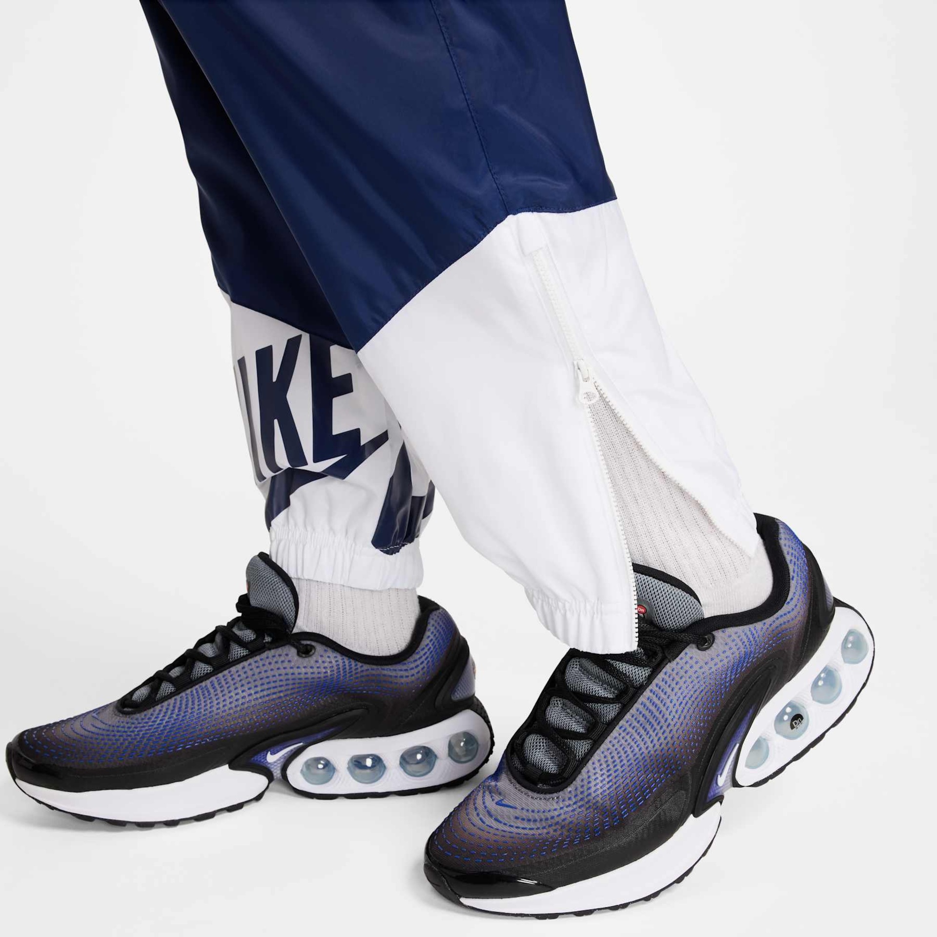 Calça Nike Windrunner Masculina - Foto 6