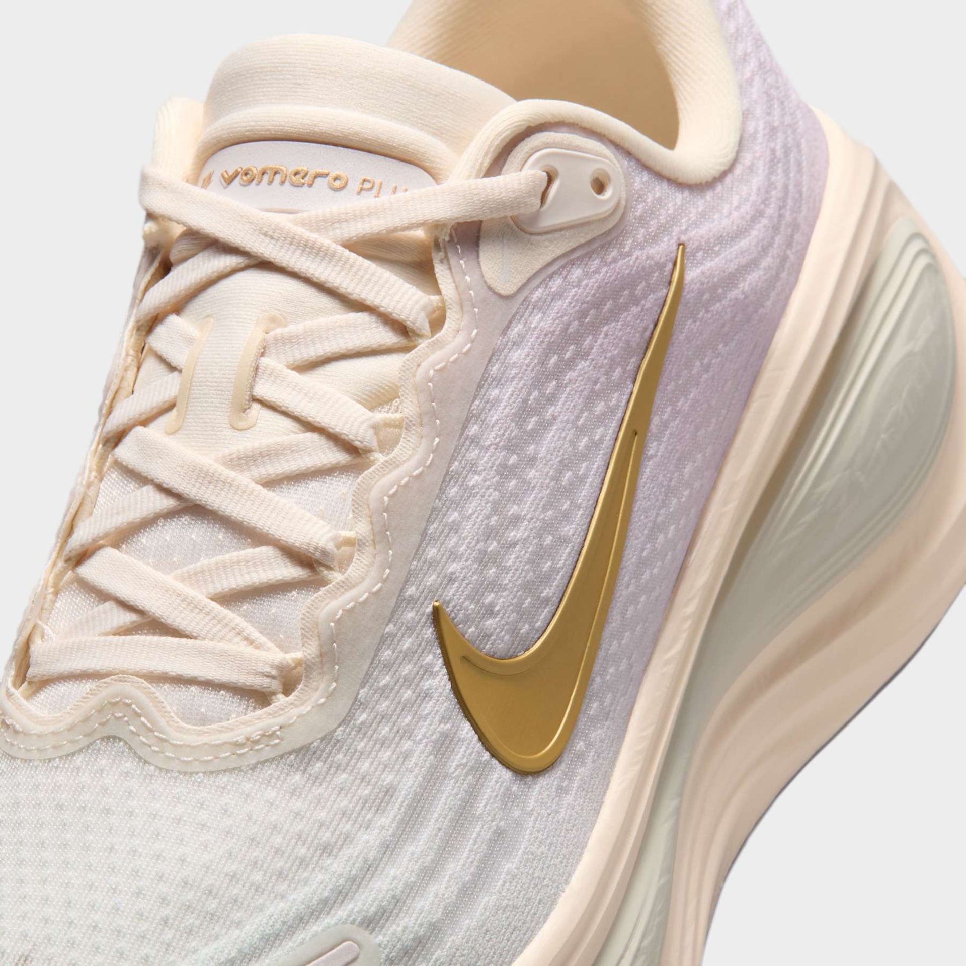 Tênis Nike Vomero Plus Feminino - Foto 7