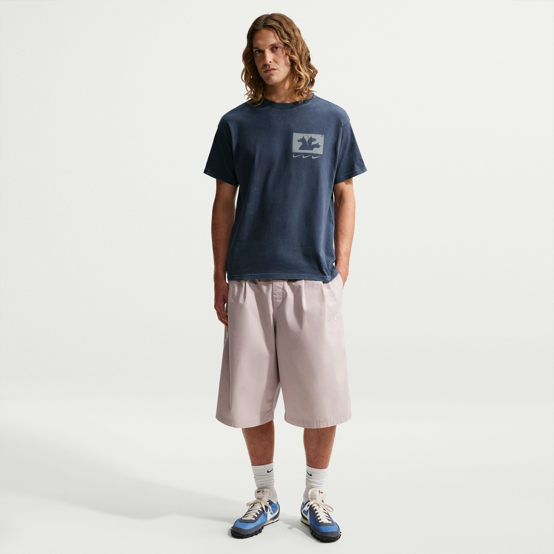 Camiseta Nike Sportswear Triple Threat Unissex - Foto 3