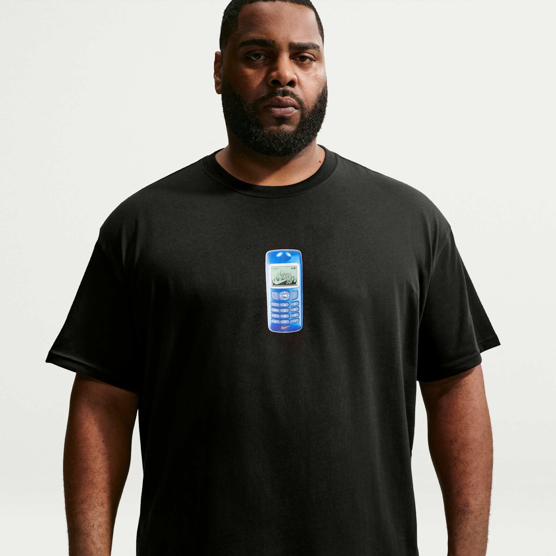 Camiseta Nike SB Phone Unissex - Foto 6
