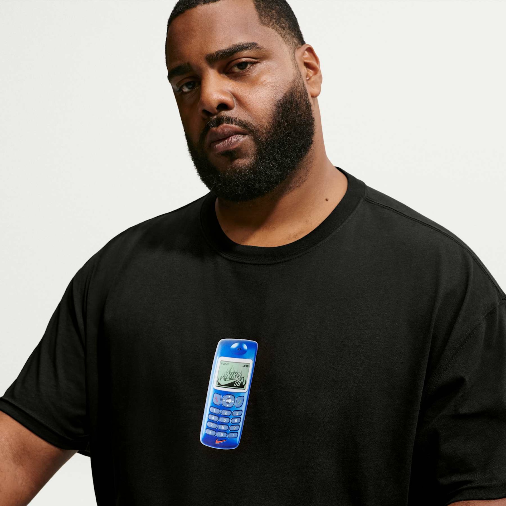 Camiseta Nike SB Phone Unissex - Foto 8