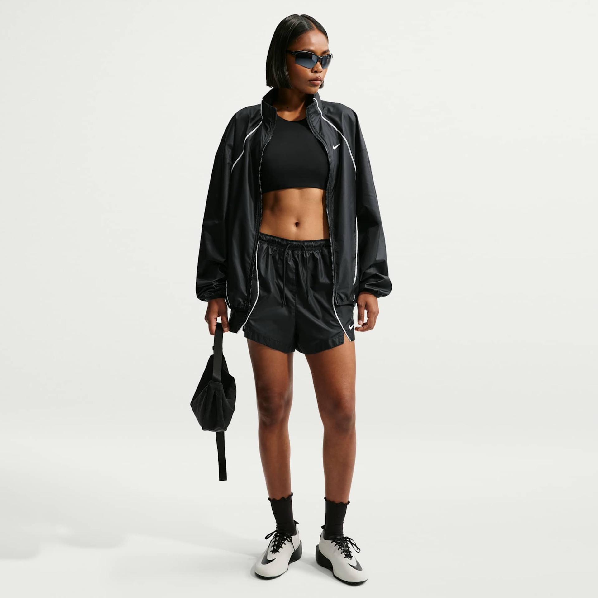 Jaqueta Nike Athletics Water-Repellent Feminina - Foto 4