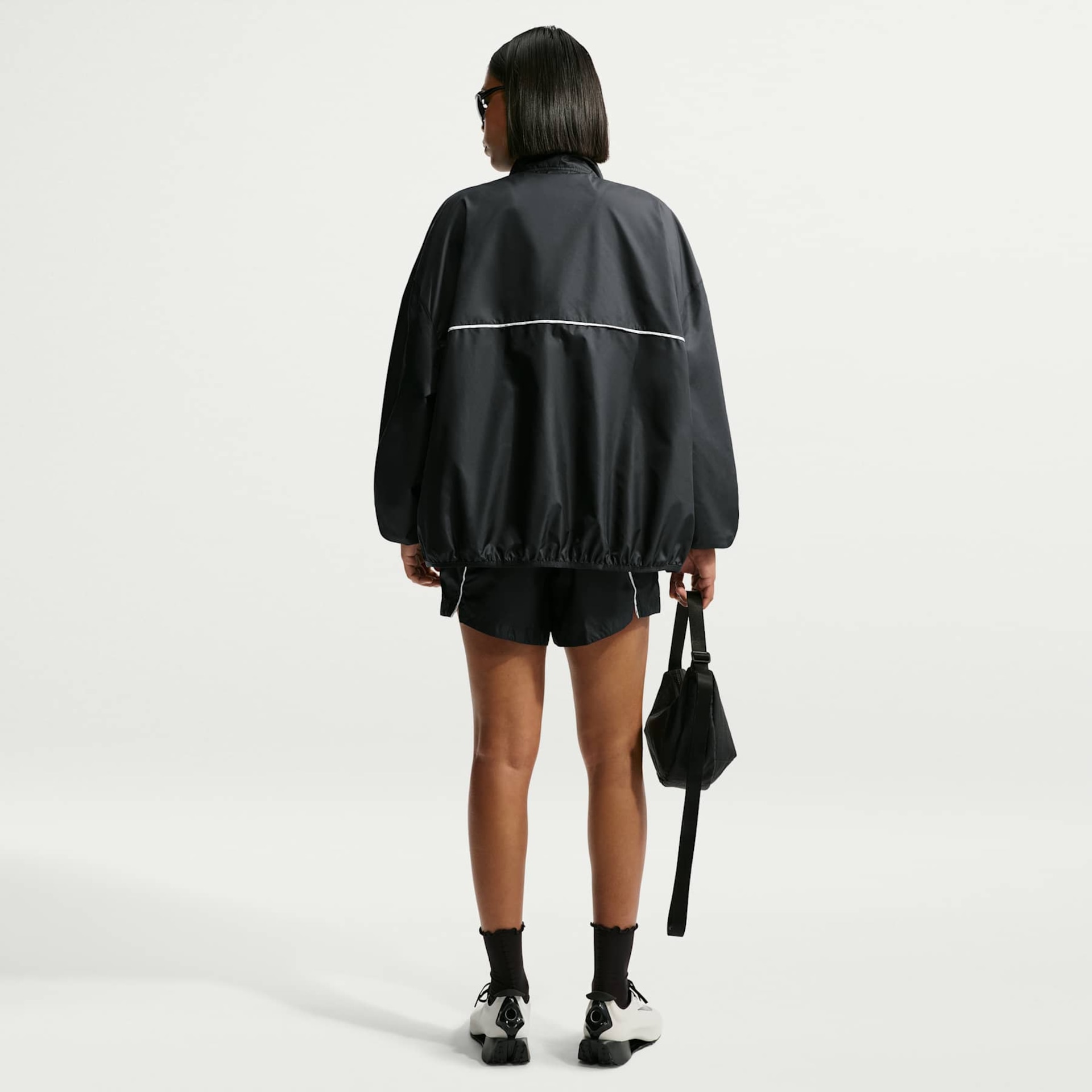 Jaqueta Nike Athletics Water-Repellent Feminina - Foto 5