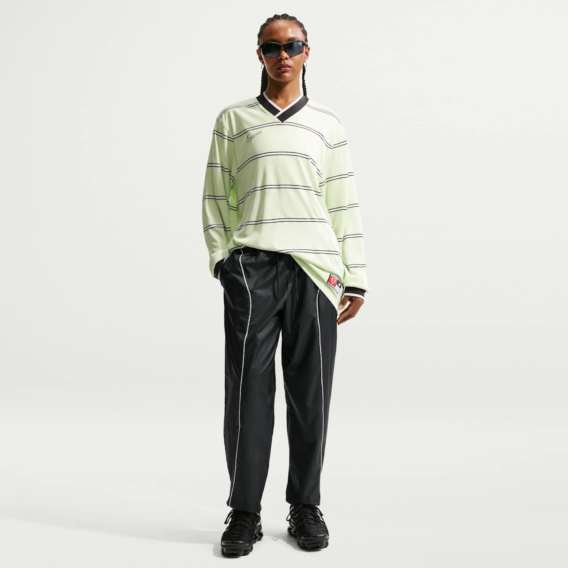 Imagem principal de Calça Nike Athletics Department Woven Feminina