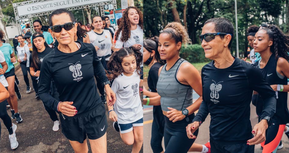 Neide Santos correndo com outras mulheres e crianças.